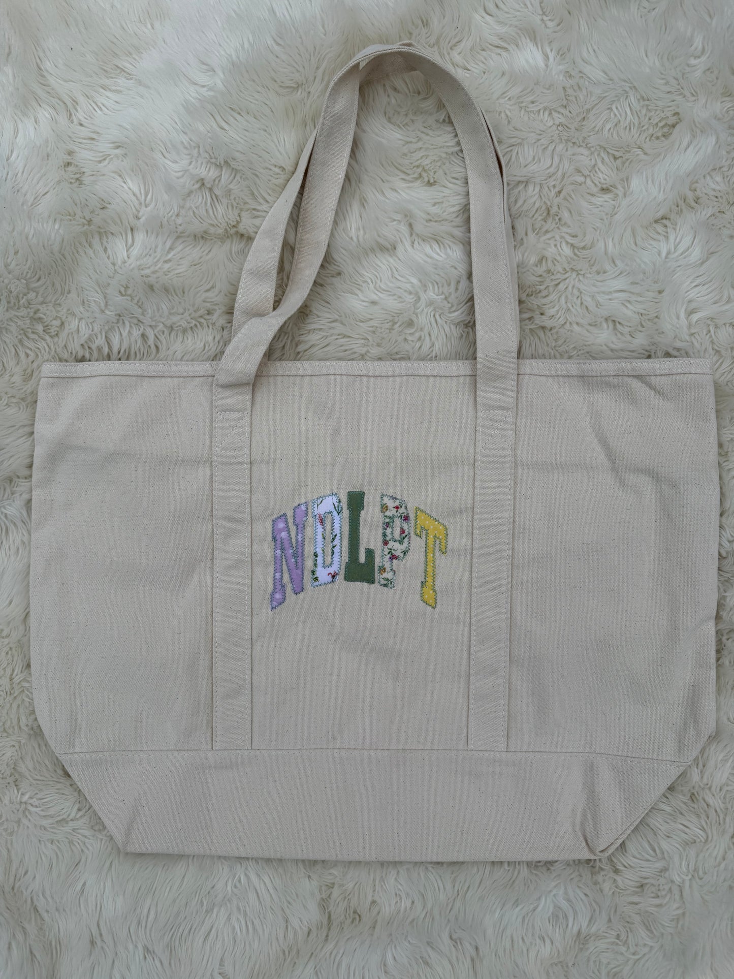 NDLPT Appliqué Zip Top Tote Bag