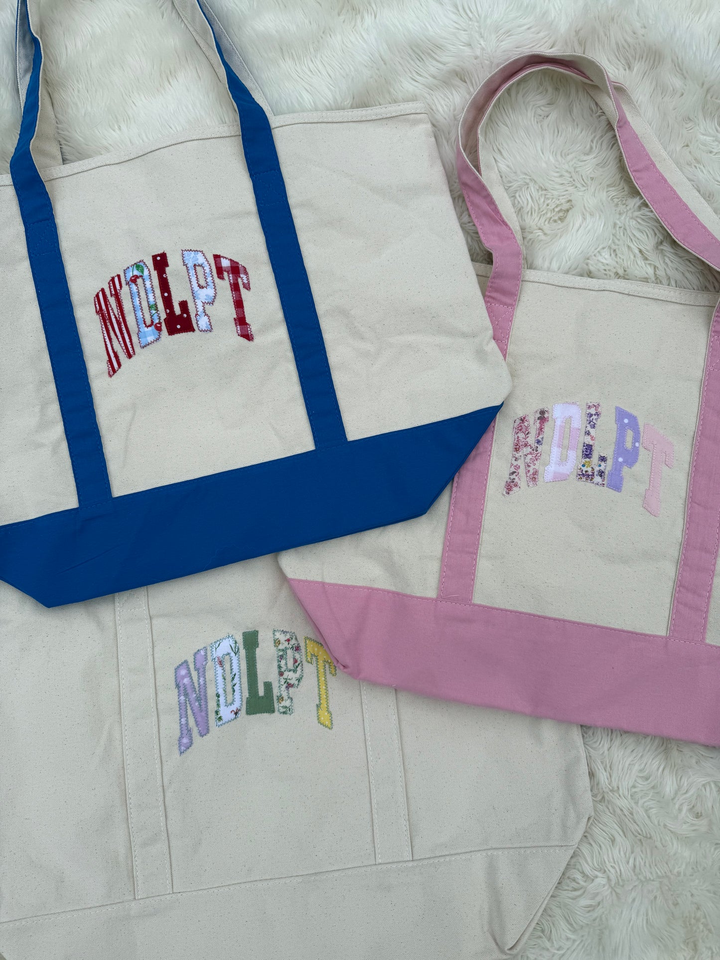 NDLPT Appliqué Zip Top Tote Bag